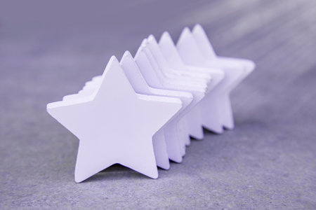 white stars on a gray background. The concept of success and ratings. Rating of Resort hotels...