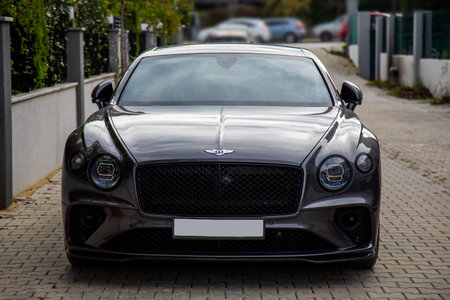 Izmir, Turkey - January 2024: Bentley silver color car on the street