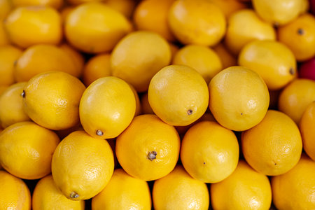 Yellow fruits on the market, close-up, background.の写真素材