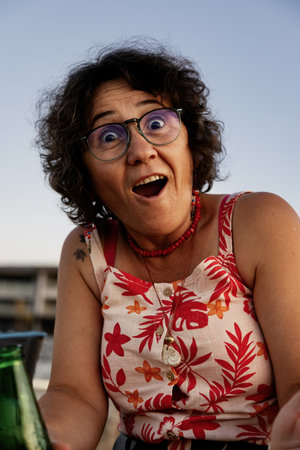Portrait of a happy senior woman at the beach.の写真素材