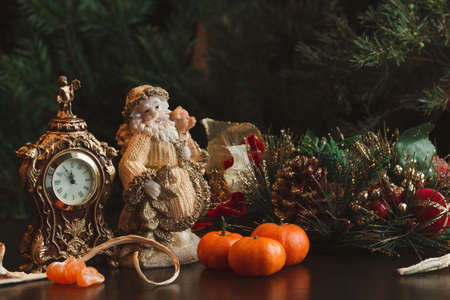 Christmas card. New year Composition Tangerines, nuts, spruce, candyの写真素材