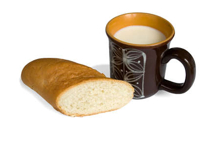 White bread and a mug with a milk on a white background.の写真素材