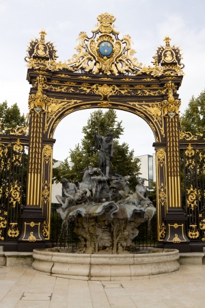 The fountain of Neptune and gilded gate in Nancy, Franceの写真素材
