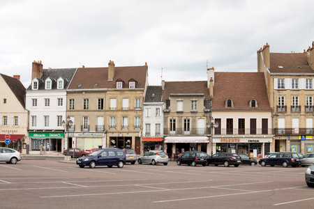 The row of ancient houses on the central square in the historical center of Autun  Autun is a...