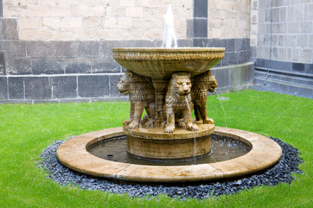 The Lion fountain in the courtyard of the Maria Laach abbey in Germany  The abbey is a Benedictine abbey   It was founded in 1093   The fountain in the courtyard was added in 1928 の写真素材