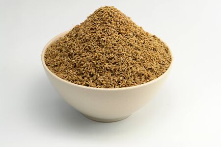 A Bowl of Anise Seed on whiteの写真素材