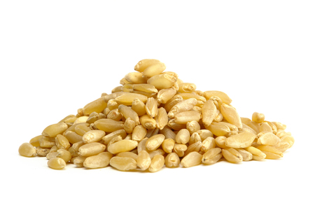 Smal amount of wheat on white backgroundの写真素材