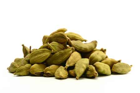 Green cardamom spice on white backgroundの写真素材