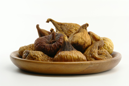 A Plate of Dried Figs (Isolated on white background)の写真素材