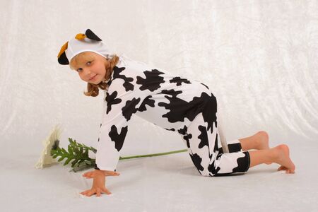 The girl in a fancy dress of the cowの写真素材