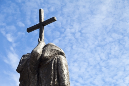Orthodox sacred Kirill and Mefodiy with a cross against the blue skyの写真素材