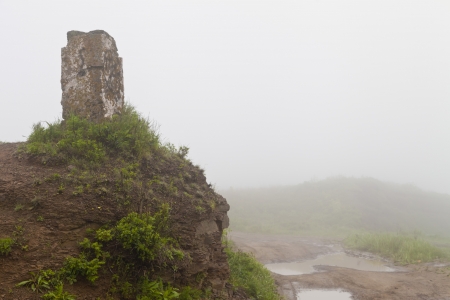 Stone ruins in a fog early in the morningの写真素材