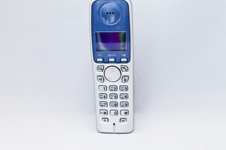 Mobile phones separately and together, sometimes with a hand of the womanの写真素材