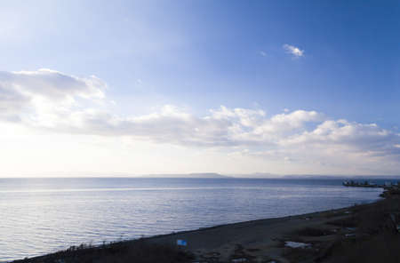 Sea landscape in beams of the coming sunの写真素材