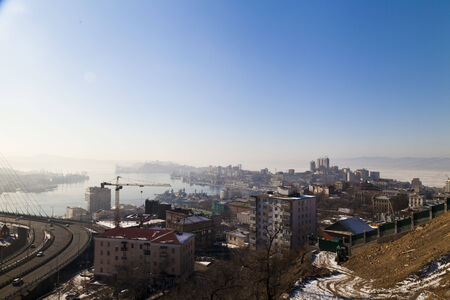 Townscape in beams of the bright midday sunの写真素材