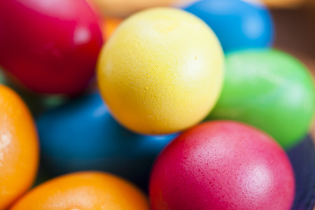 Easter eggs lie on a table waiting for Easterの写真素材