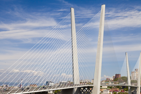 Big suspension bridge against the blue sky in the sunny dayのeditorial素材