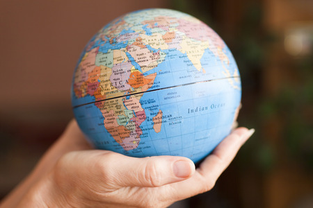 The earth in hands of the person - very small, it should be protected