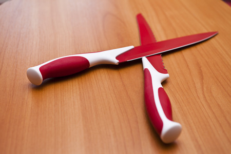 Knives on a table lie waiting for workの写真素材