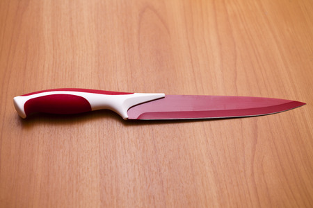 Knives on a table lie waiting for workの写真素材