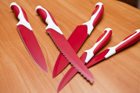 Knives on a table lie waiting for workの写真素材
