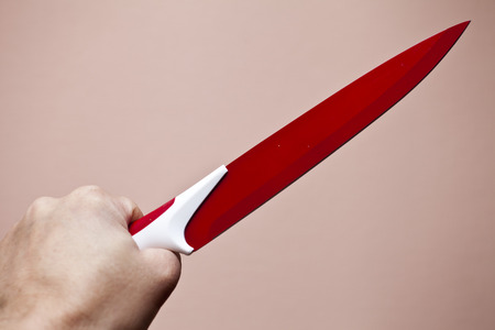 The knife in a hand threatens the one who will come nearerの写真素材