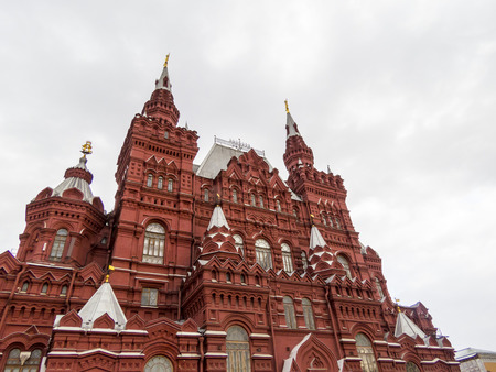 The big ancient building costs at the embankment in cloudy day
