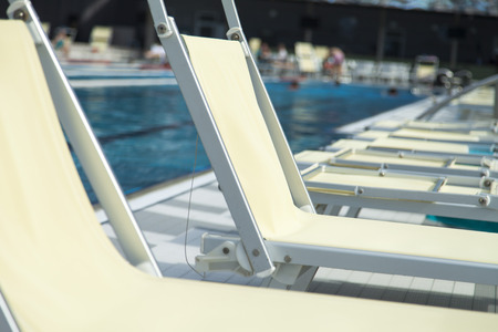 The swimming pool under beams of the sun is ready to competitions and restの写真素材