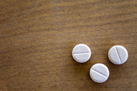 The pill on a table is waited when accept them insideの写真素材