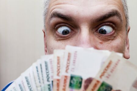 The pack of rubles waits for that will spend it in shop or in the marketの写真素材