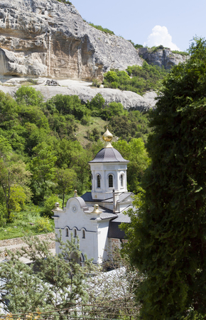 The orthodox church in mountains is constructed in a hard-to-reach spotの写真素材