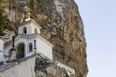 The orthodox church in mountains is constructed in a hard-to-reach spotの写真素材