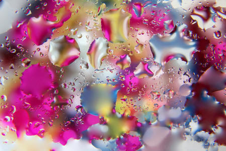 Background of colored drops of waterの写真素材
