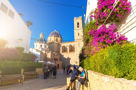 Altea, Spain. November 14, 2017: Tourists near the Church of Our Lady of Consuelo in Altea, in the...