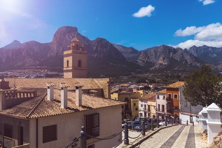 Spain, Alicante, Polop - 20 April, 2018: Panoramic view of the old city Polop against the backdrop of the mountains of the Costa Blanca peninsulaのeditorial素材