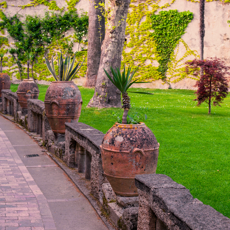 Picture postcard with terrace with flowers and trees in the garden Amalfi Coast, Campania, Italyの写真素材