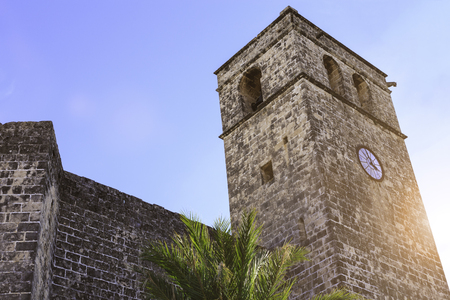 The bell tower of Saint Bartholomew church in the old town of Xabia, also known as Javea, in Spainの写真素材