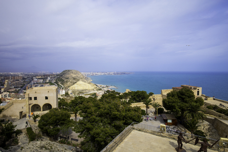 Wide angle view of Alicante, Spain from Santa Barbara Castle. Panoramic view of the city, the harbor and the hills. Place to visit citizens and tourists.の写真素材