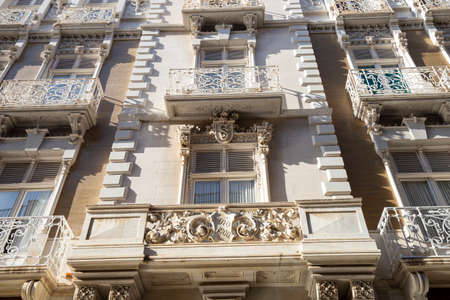 Cartagena, Spain - November 17, 2017: facades of houses on the main street of the city with beautiful architecture.のeditorial素材