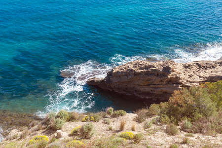 Top view of cliffs, bays, clear sea - nature background.の写真素材