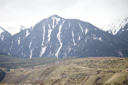 Beautiful mountain landscape. Wildlife Kyrgyzstan. Clouds in the sky. Kyrgyzstan. High quality photo