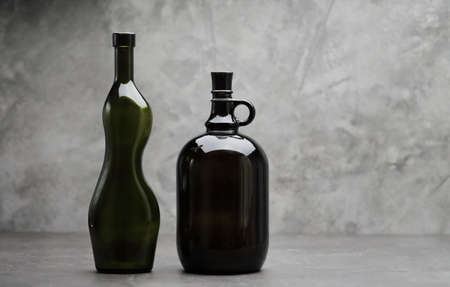 Wine bottle on a concrete background. Free space for inscription Fitness conceptの写真素材