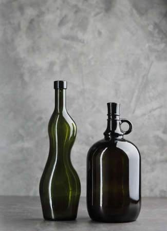 Wine bottle on a concrete background. Free space for inscription Fitness conceptの写真素材