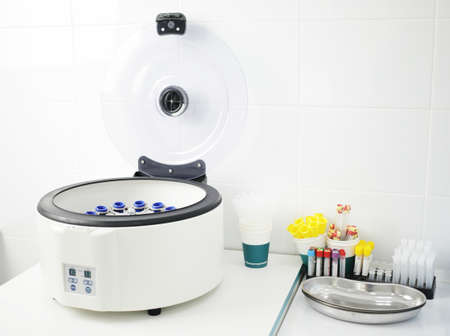 Laboratory medical centrifuge for the separation of blood components. High quality photo