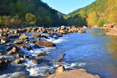 landscape with stream flowing over rocks. long exposureの写真素材