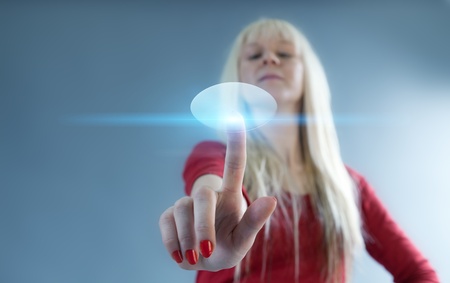 Blonde touches the button. Future series.の写真素材