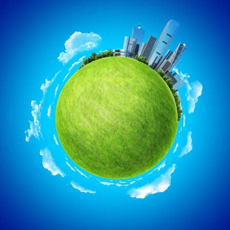 Mini planet concept  City on horizon and empty space on fresh green field  Earth collection の写真素材