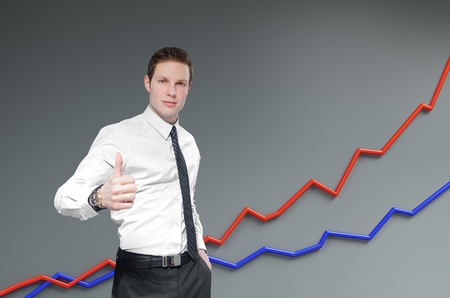 Financial report   statistics  Business success concept  Businessman shows thumb up with growth progress graph on background の写真素材