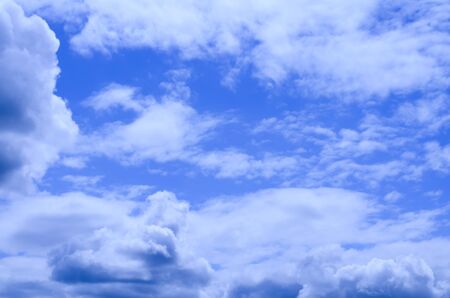 Clean blue sky and various cloud formations picture.の写真素材
