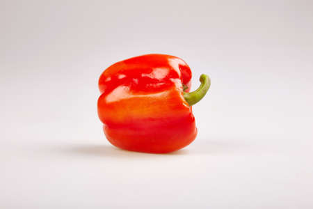 Sweet paprika pepper cut on white backgroundの写真素材